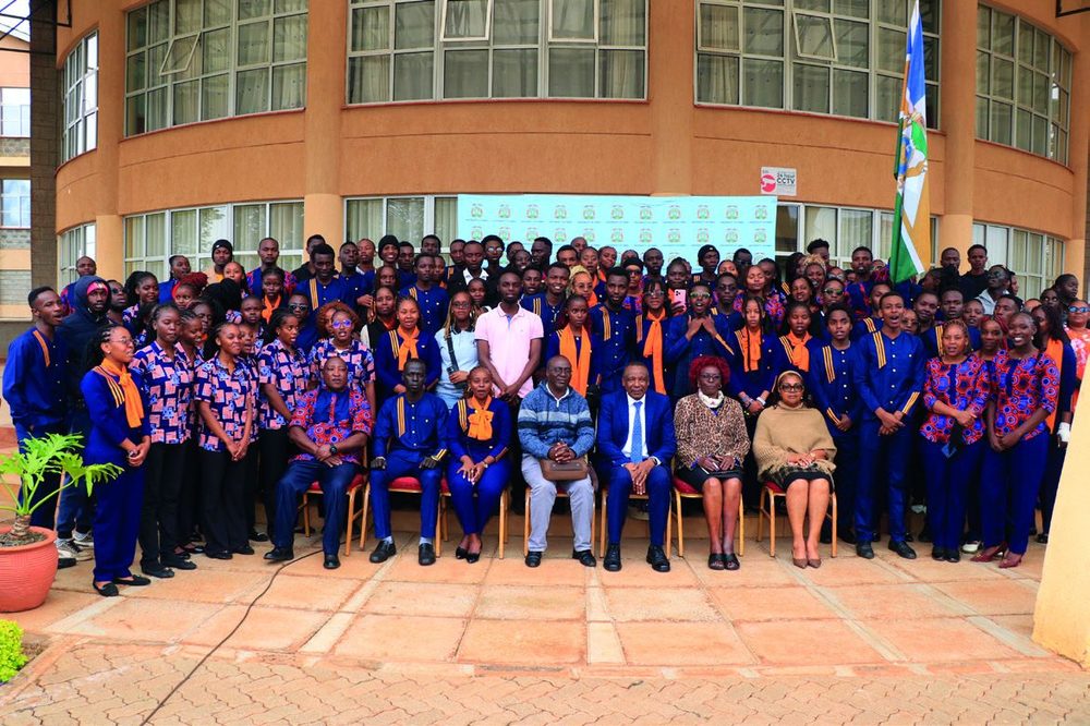 The University of Embu Drama and Poetry team with their trophies.